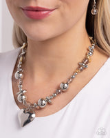 Glistening Gossip - Silver Heart Necklace Paparazzi