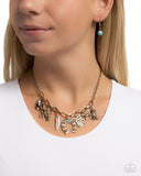 Saloon Girl - Gold Western Charm Necklace Paparazzi