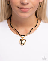 Falling Slowly - Gold & Black Heart Necklace Paparazzi