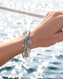 Refreshing Revel -  Blue Coil Bracelet Paparazzi