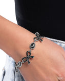 Coquette Caliber - Black Bracelet Paparazzi