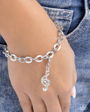 TREBLE-maker - White Treble Clef Charm Paparazzi