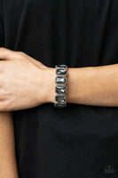 Studded Smolder - Silver Bracelet Paparazzi