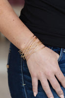 Strike Out Shimmer - Gold Bracelet Paparazzi